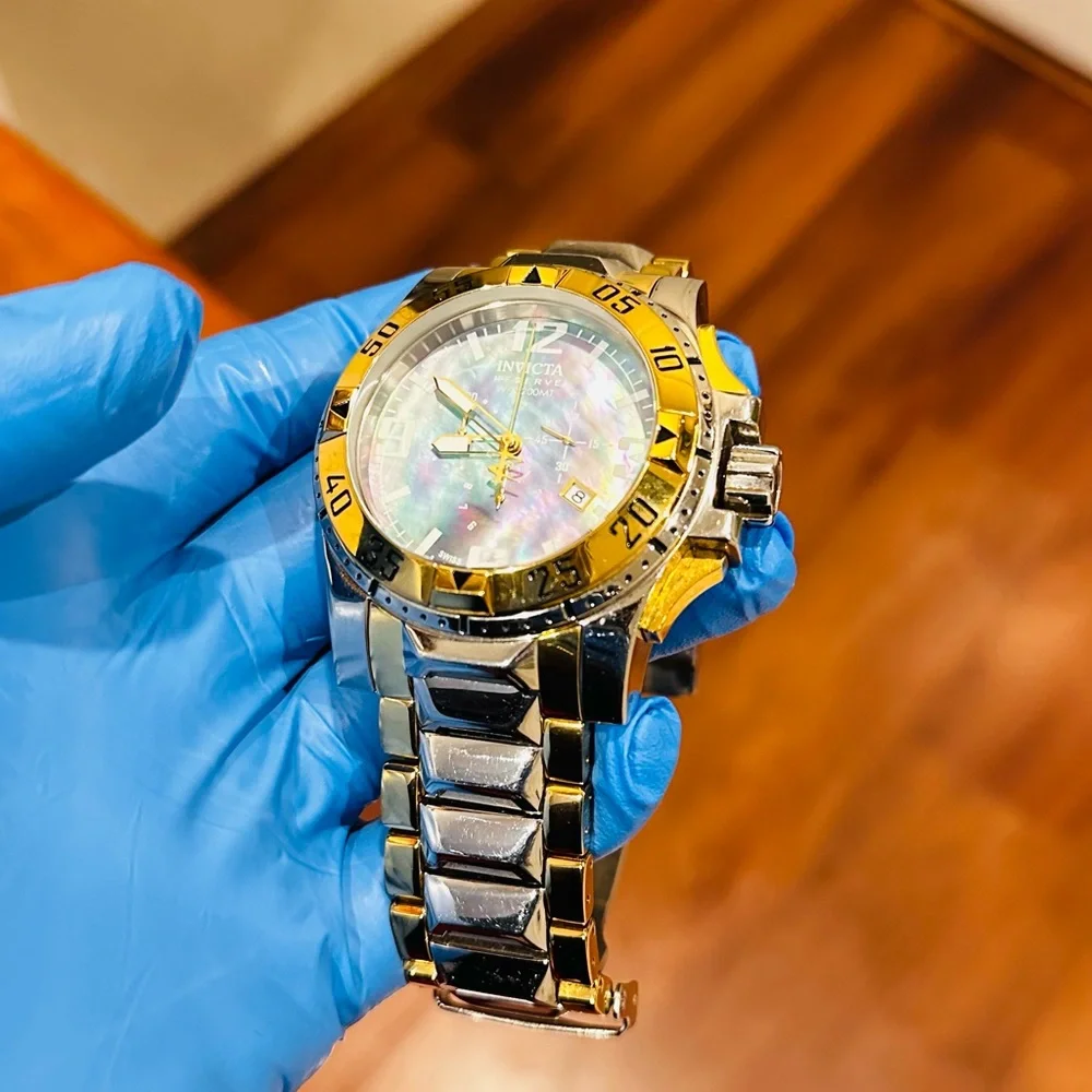 Invicta Reserve Excursion Gold and Silver High Polish watch.